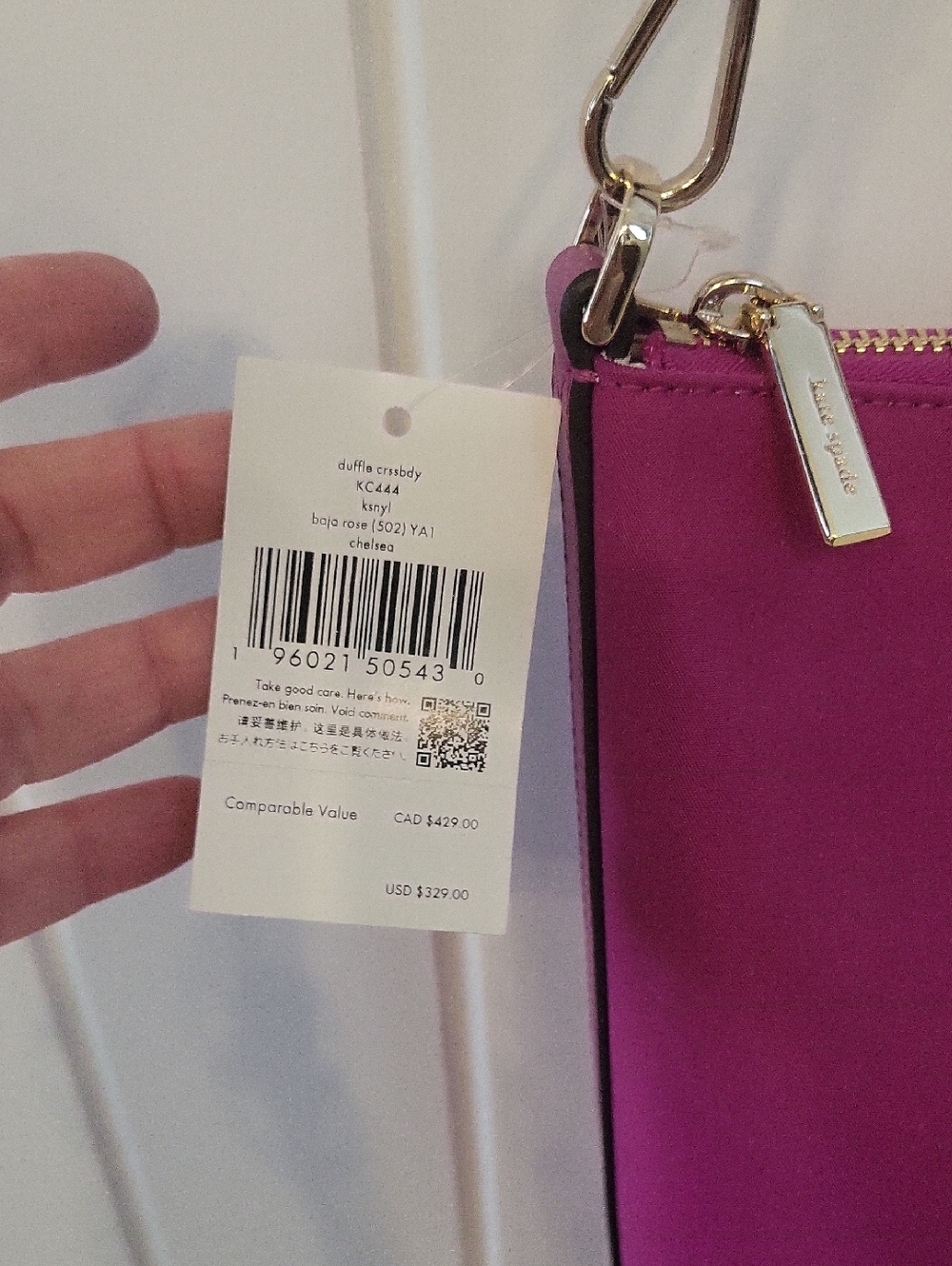 kate spade magenta wristlet with gold hardware